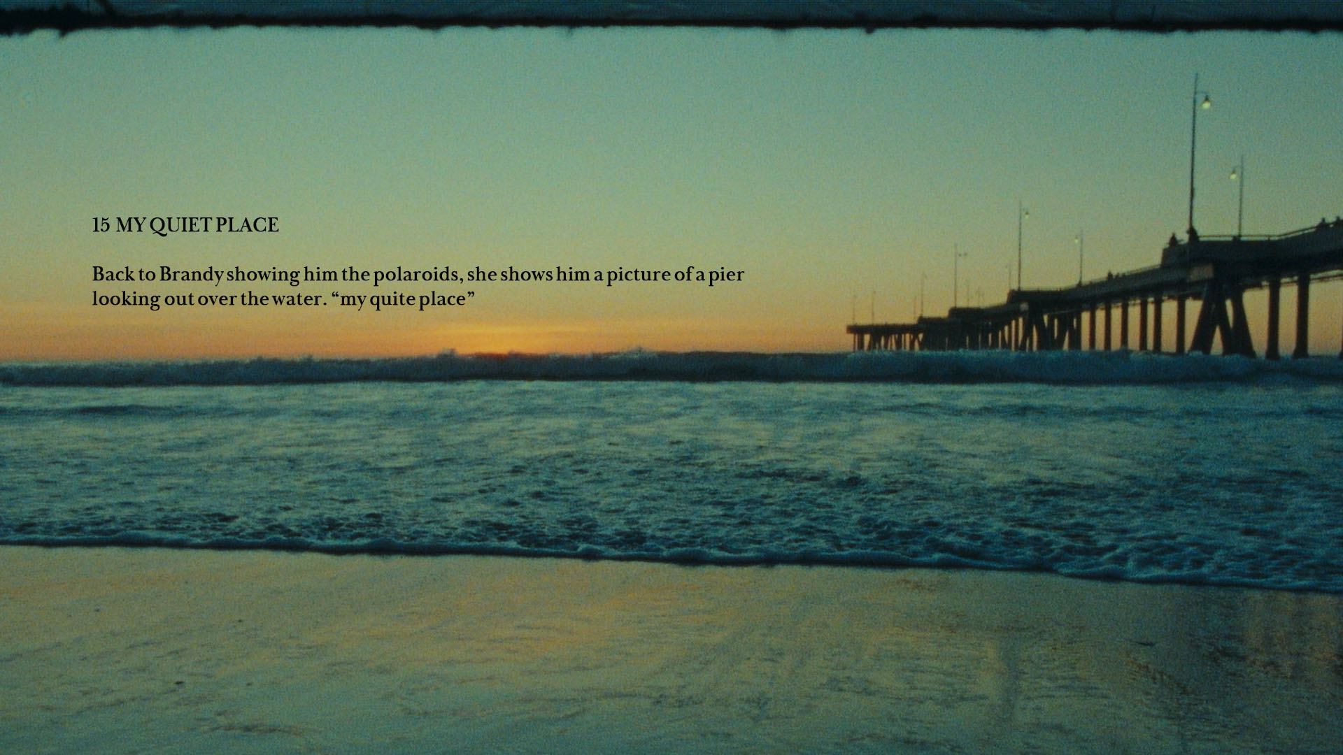 A sunset view of a pier extending over the ocean.